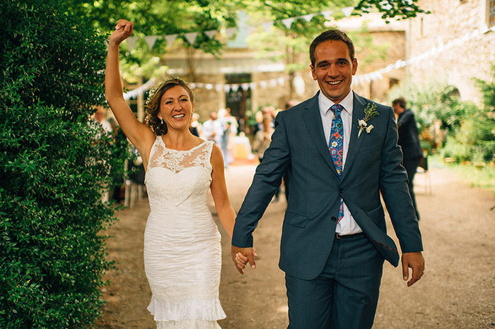 bride and groom celebrating after ceremony