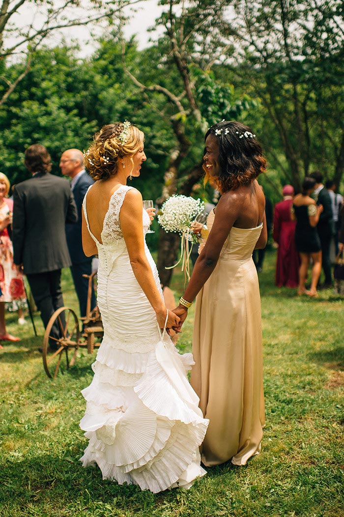 bride and bridesmaid at reception