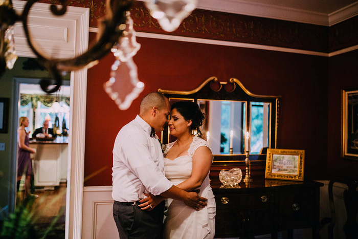 bride and groom embracing