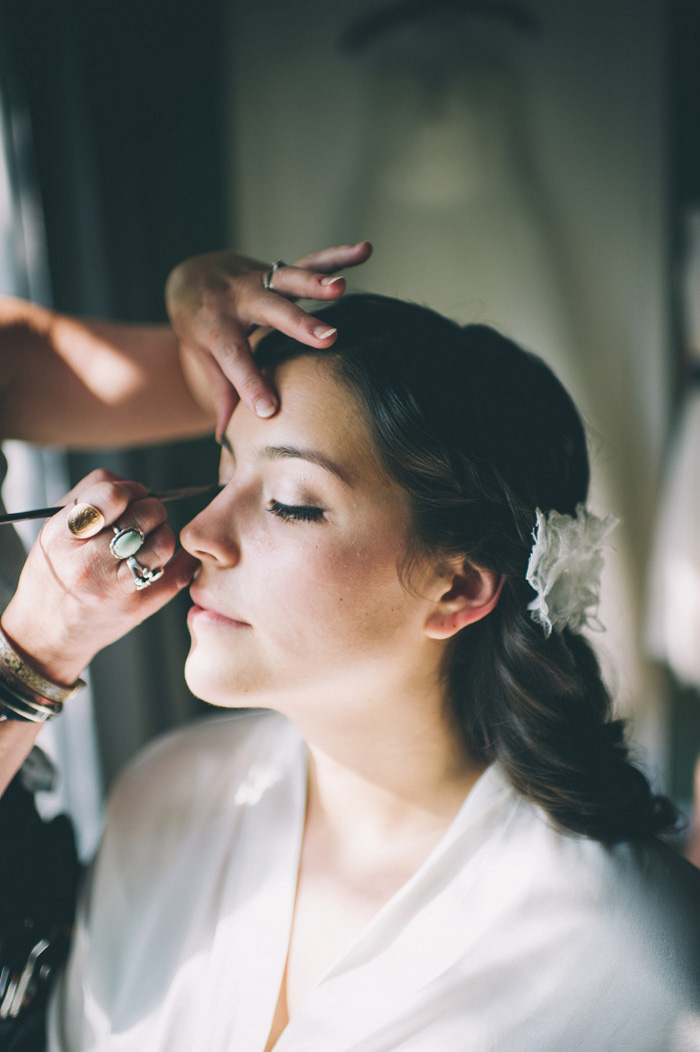 bride getting her make-up done