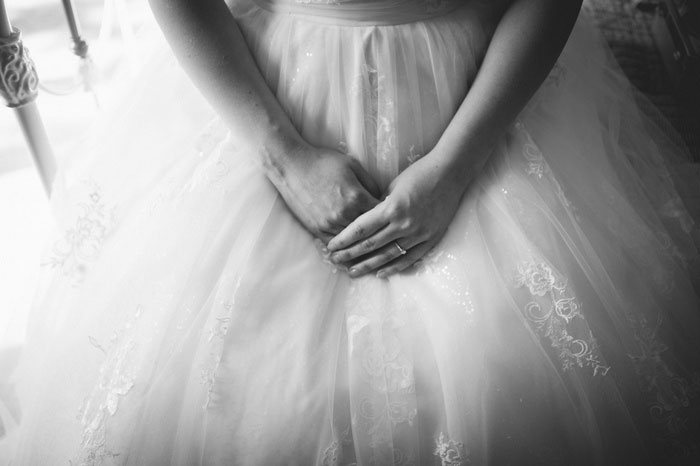 bride's hands in her lap