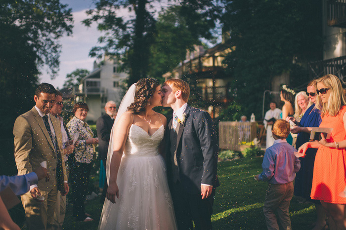 bride and groom kissing at end of ceremony