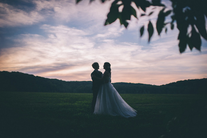 bride and groom portrait at dusk