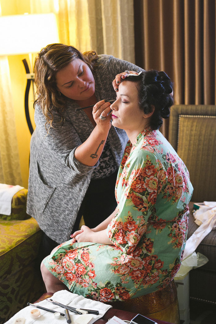 bride getting her make-up done