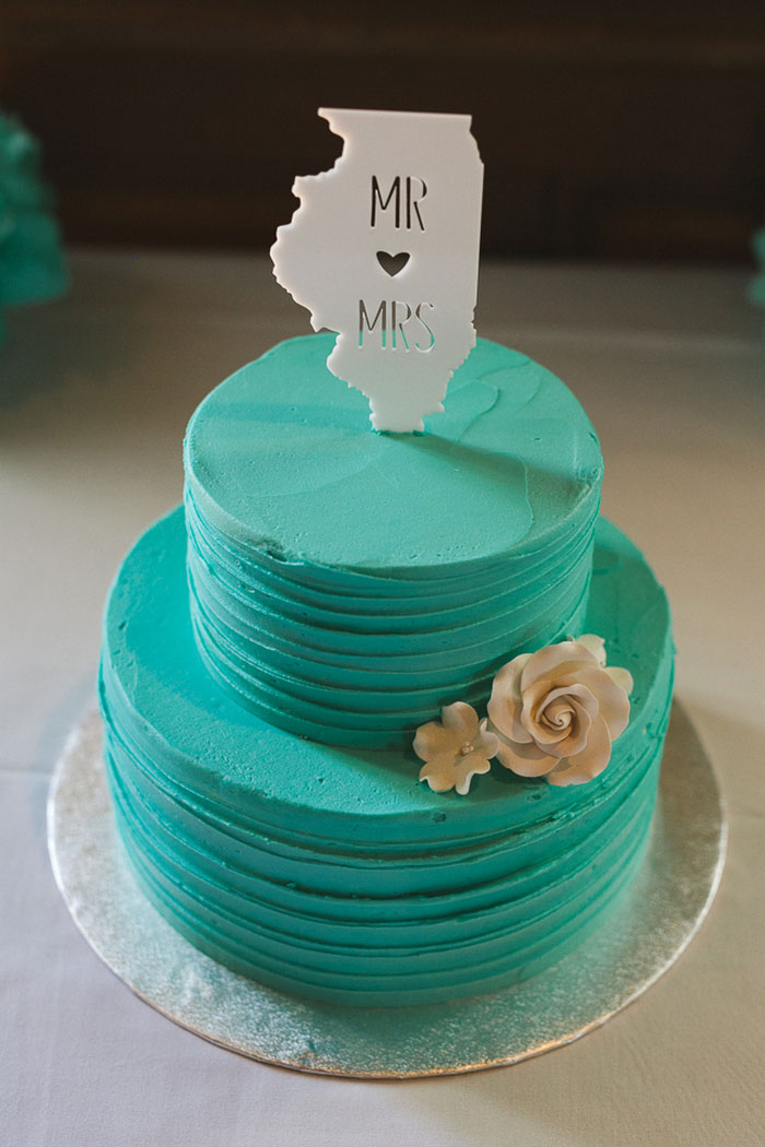 wedding cake with state cake topper