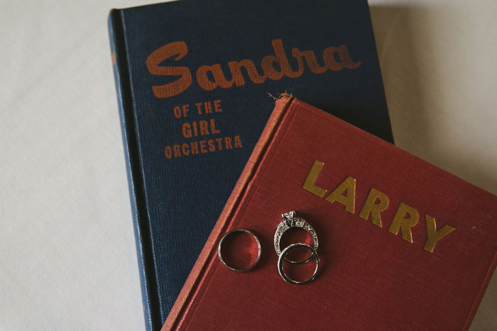 wedding rings on books