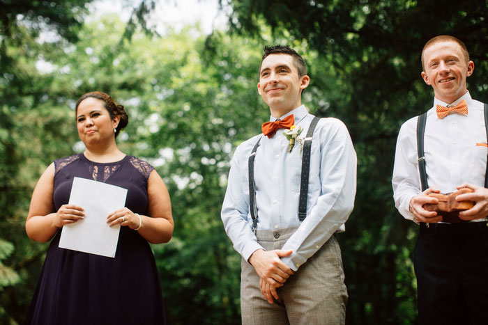 groom waiting at the altar