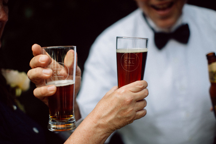 wedding guests with brown ale