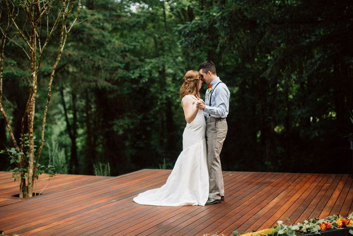 bride and groom slow dancing