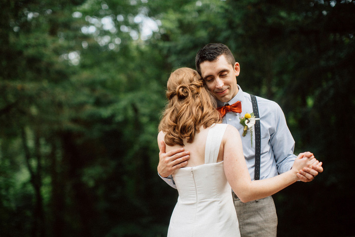 bride and groom slow dancing