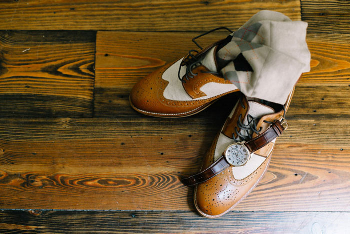 groom's wedding shoes and watch