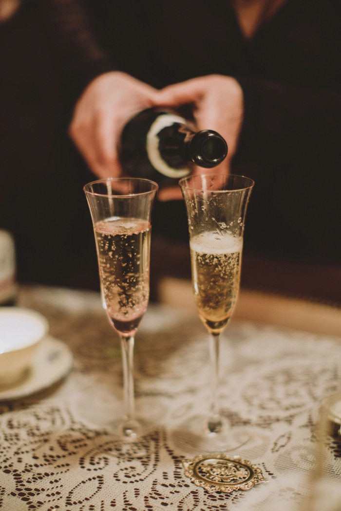 pouring flutes of champagne