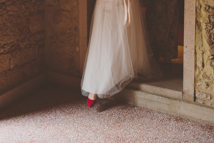 bride stepping through doorway