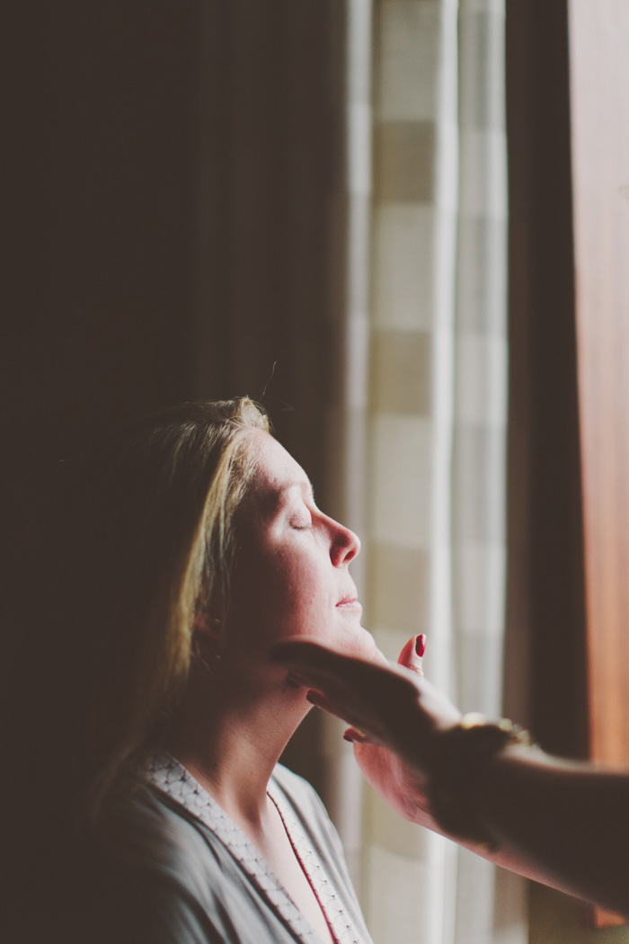 bride getting her make-up done