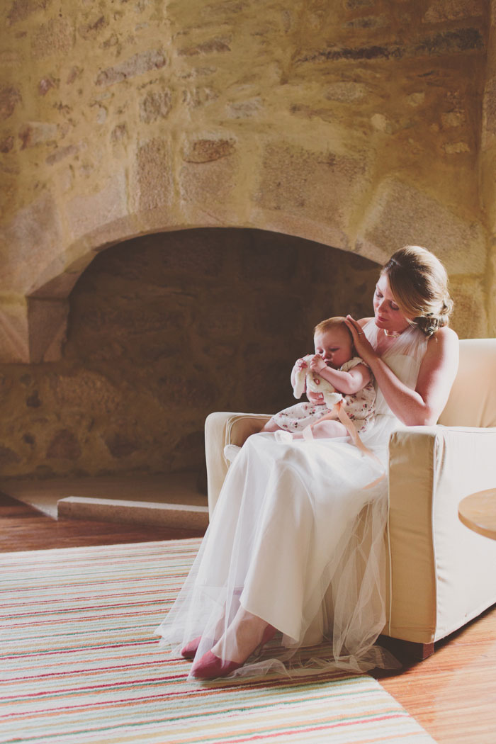 bride holding baby 