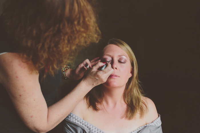 bride getting her make-up done