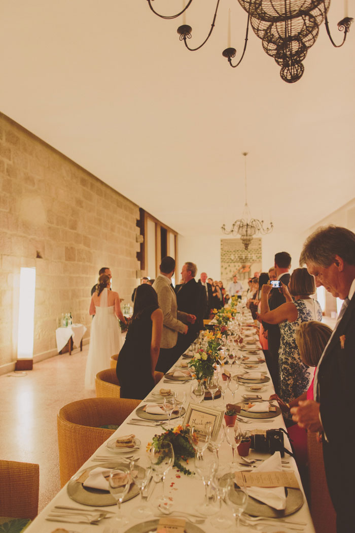 bride and groom entering reception