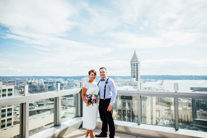 Bride and groom portrait on Seattle Courthouse roof