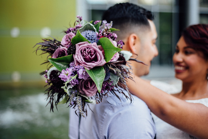 purple rose wedding bouquet