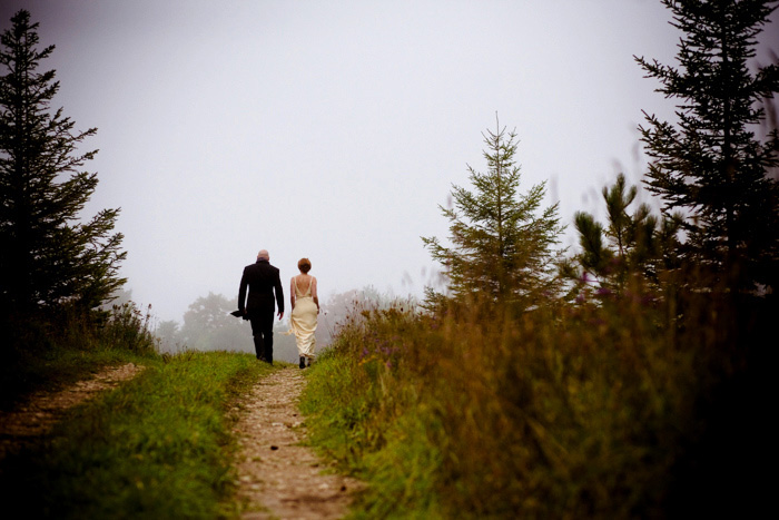 bride and groom walking away