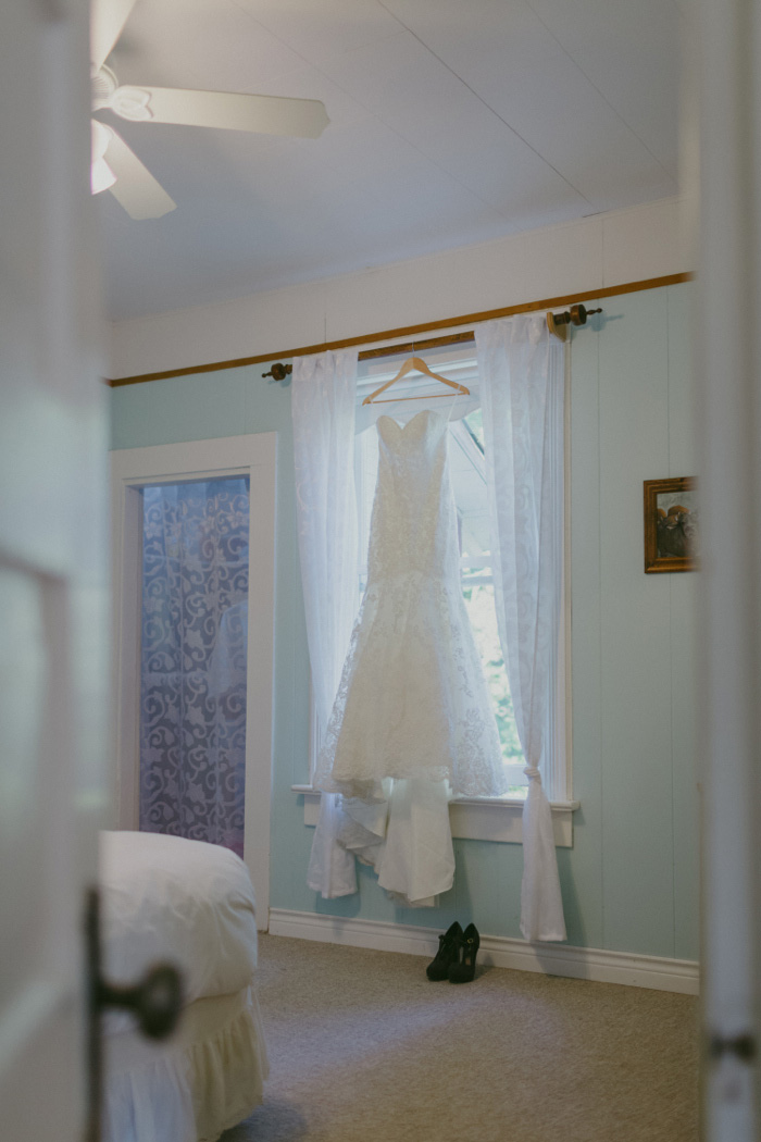 wedding dress hanging up