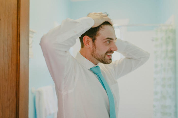 groom doing his hair