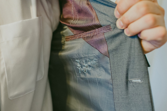 personal message embroidered in groom's jacket lining