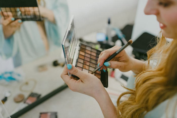 bride doing her make-up