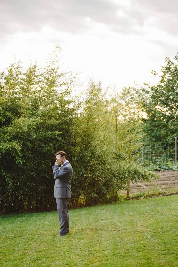 groom waiting to see his bride