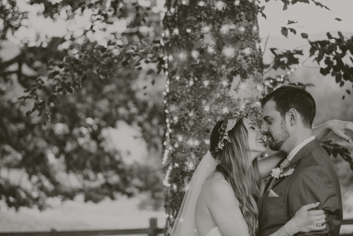 bride and groom first kiss