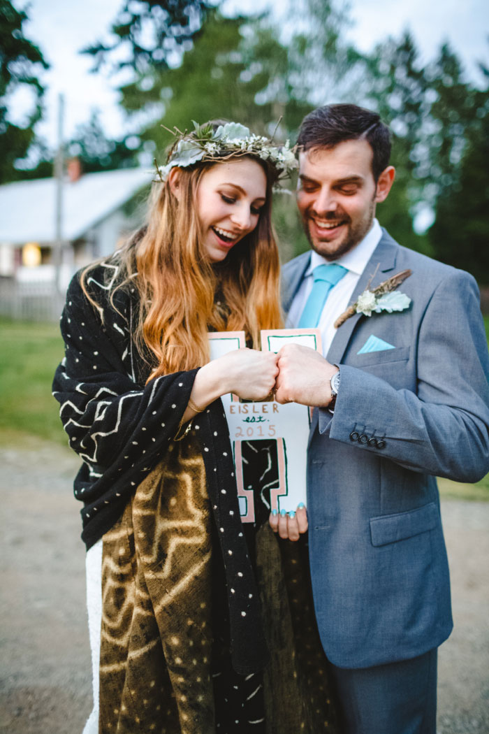 bride and groom fist bumping