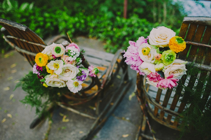 adirondack chairs decorated with flowers