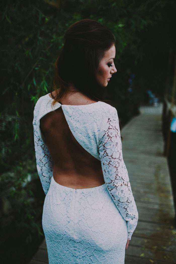 bride in backless wedding dress