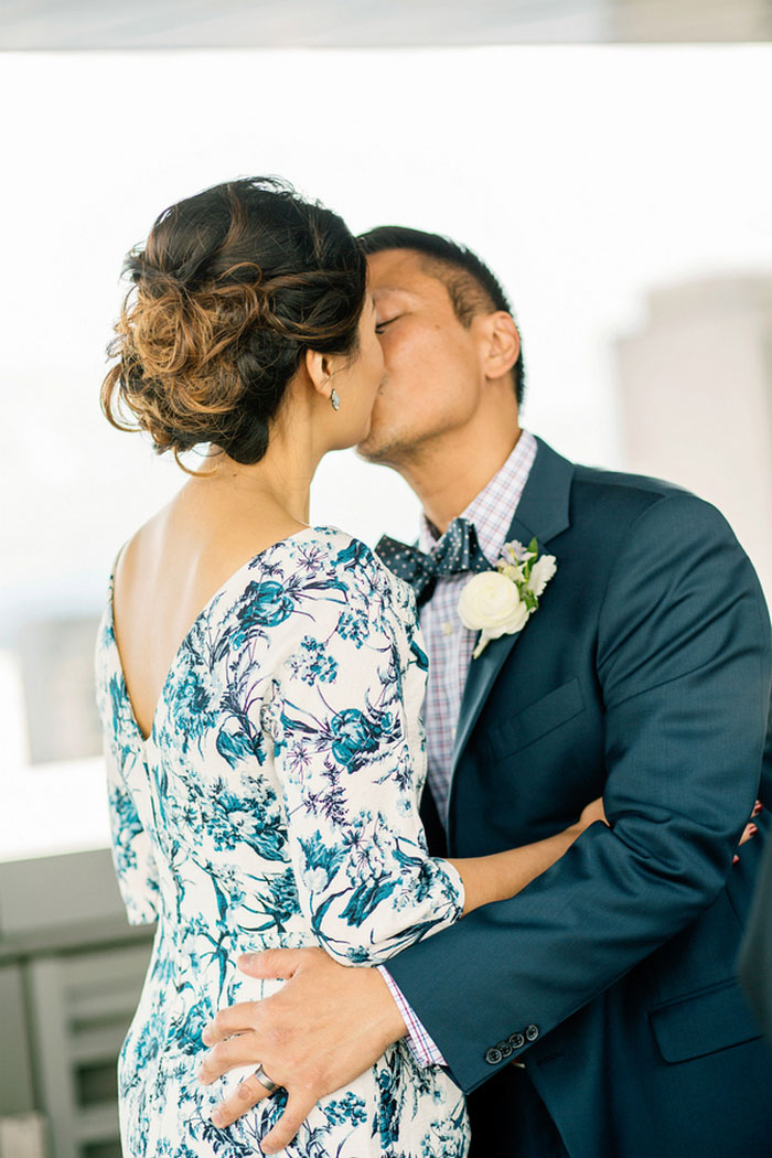 bride and groom first kiss