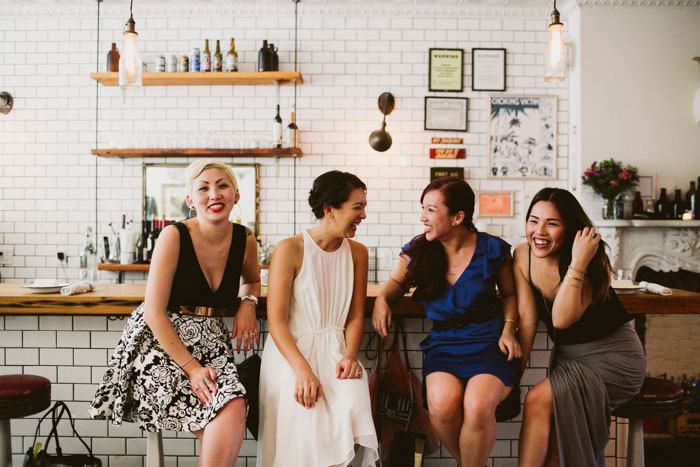 bride sitting with friends