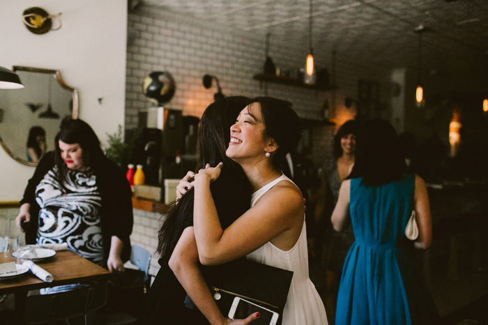 bride hugging guest