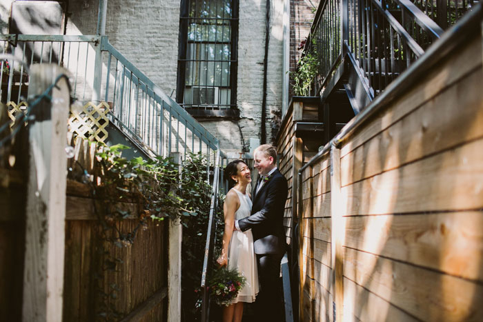 bride and groom portrait in backyard