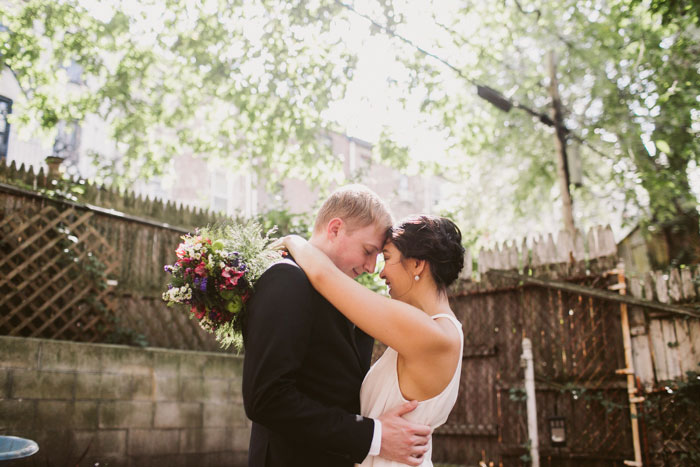 bride and groom portrait in backyard