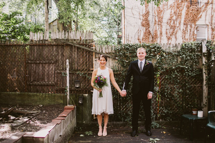 bride and groom portrait in backyard