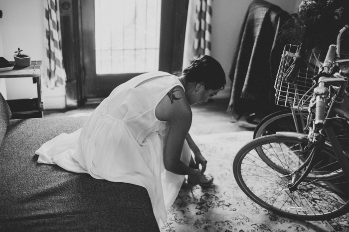 bride putting on shoes