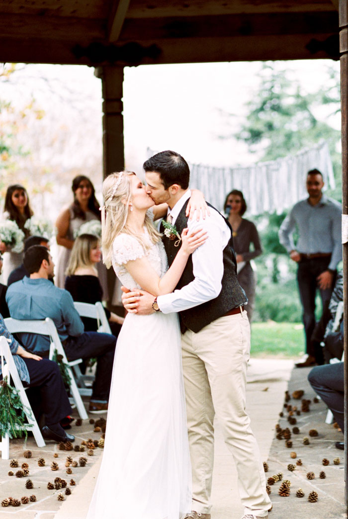 bride and groom kissing