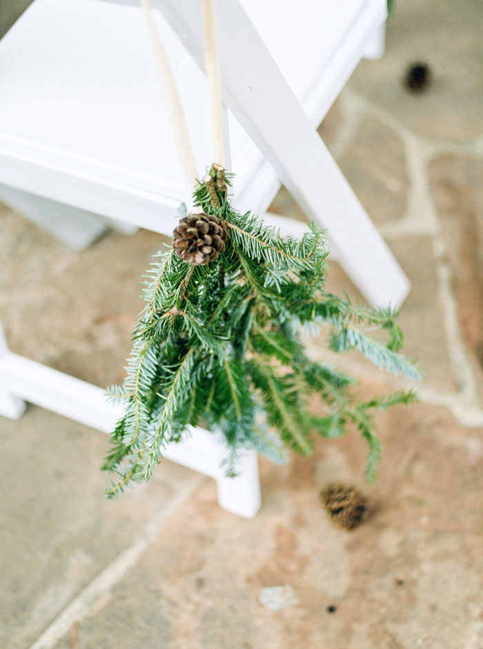 pinecone and swag ceremony chair decor