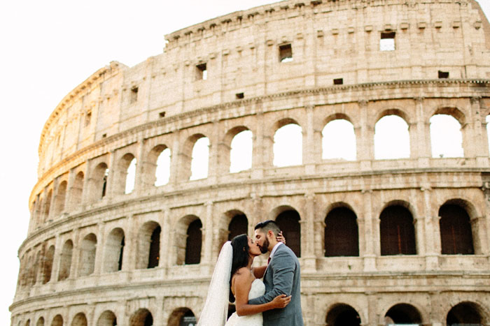 wedding portrait in front of coliseum 