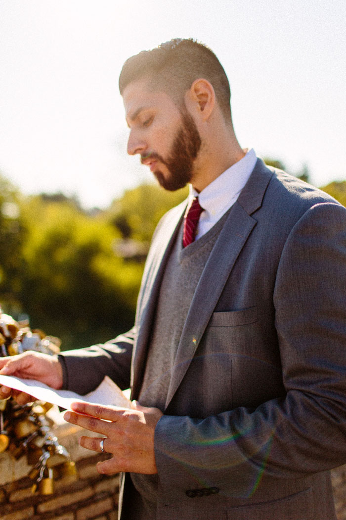 groom reading his vows