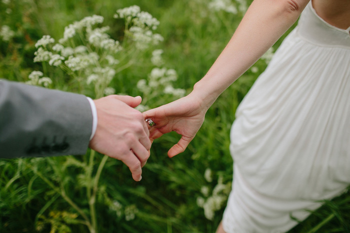 bride leading groom by the hand