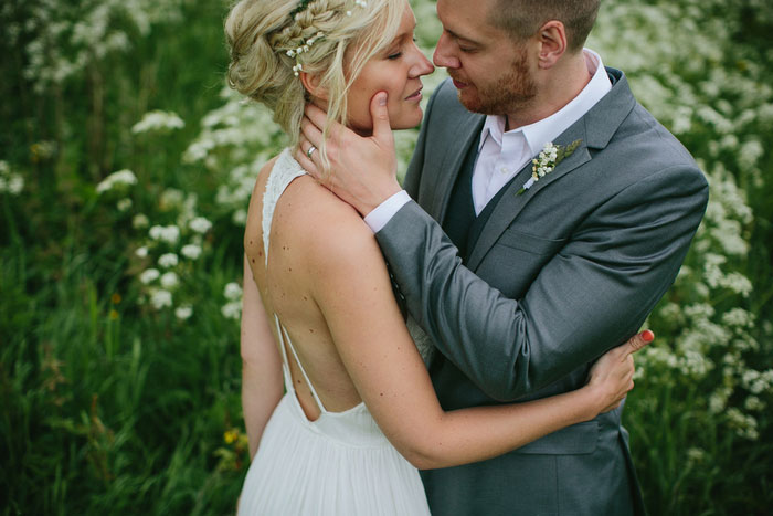 groom with hand on bride's cheek