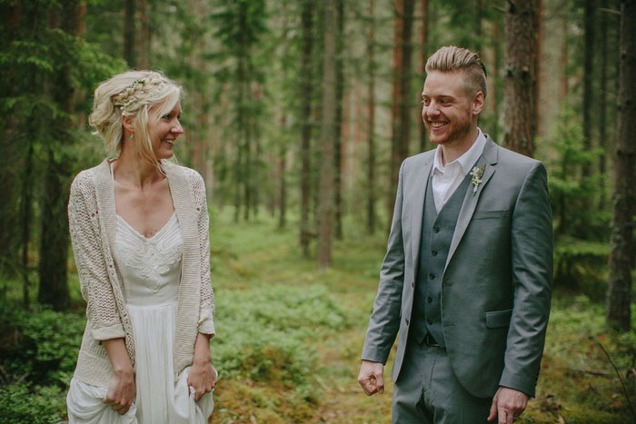 bride and groom in the woods