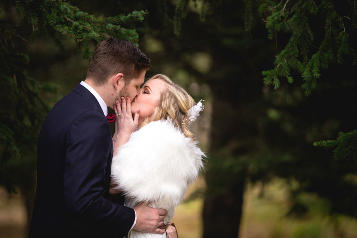 bride and groom kissing