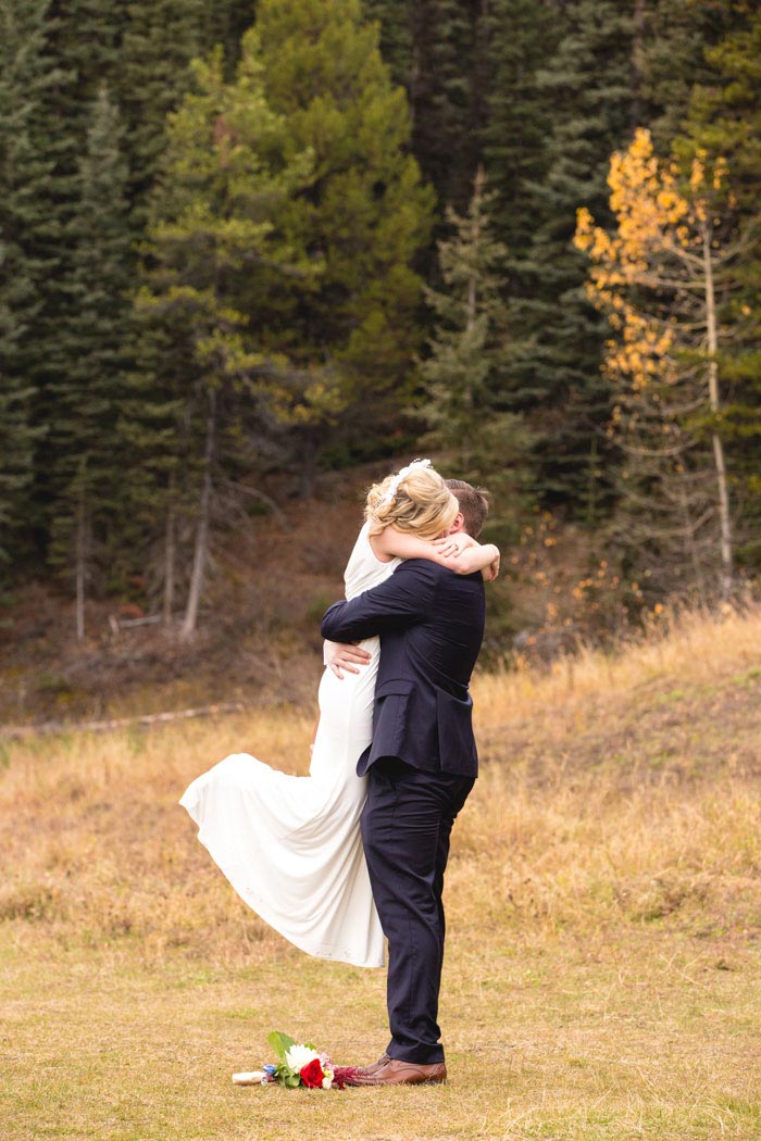 bride and groom hugging after elopement ceremony