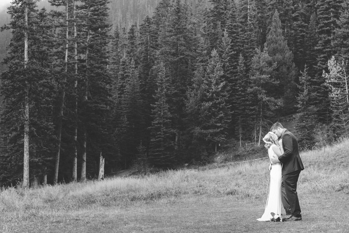 bride and groom first kiss